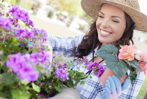 Workers handling garden waste and rubbish safely